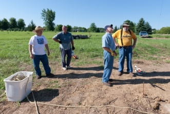 Ernie Vielhaber, Ki7K, W0GJ and W0BM -volunteers during the July 2009 tower installation